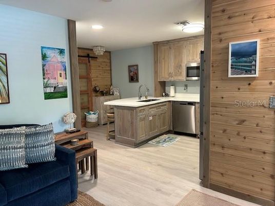 Interior, Kitchen, Recessed Lighting, Stainless Steel Appliances, Wood Texture Flooring, Wooden Walls
