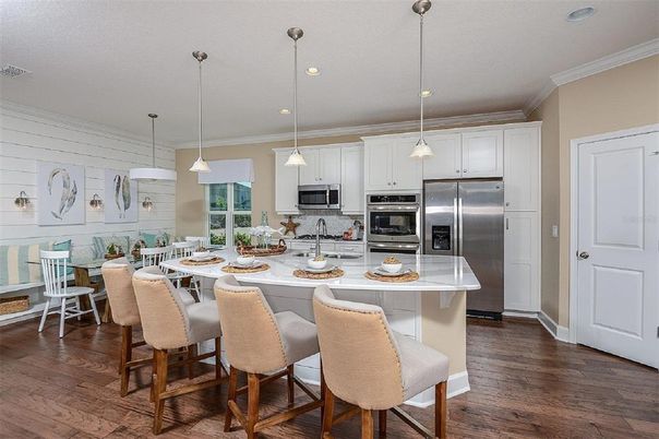 Dining room, Interior, Kitchen, Pendant Lights, Recessed Lighting, Stainless Steel Appliances, Wood Texture Flooring