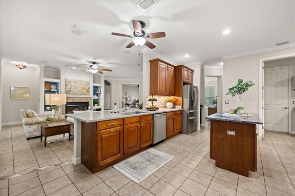 Fireplace, Interior, Kitchen, Living room, Recessed Lighting, Stainless Steel Appliances