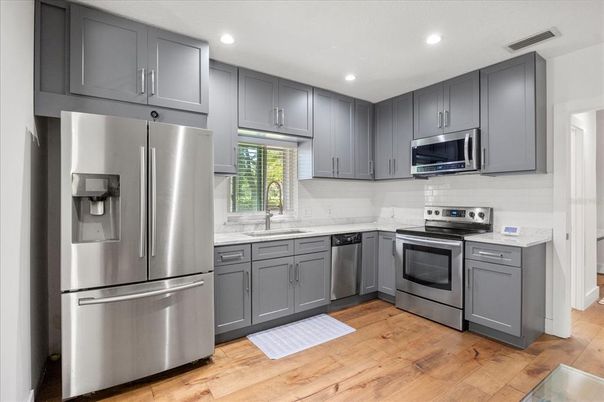 Interior, Kitchen, Recessed Lighting, Stainless Steel Appliances, Wood Texture Flooring