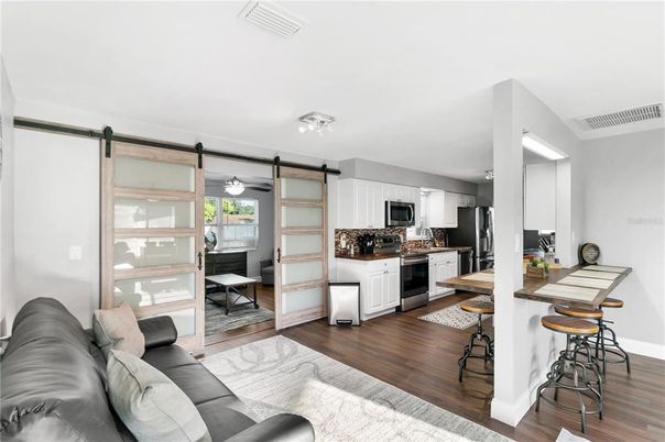 Dining room, Interior, Kitchen, Living room, Stainless Steel Appliances, Wood Texture Flooring