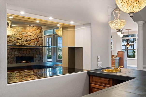 Chandelier, Fireplace, Interior, Recessed Lighting, Stone Walls