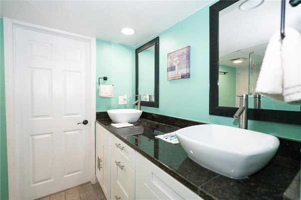 Bathroom, Dual Sink Vanities, Free Standing Baths, Interior, Recessed Lighting, Wood Texture Flooring