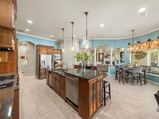 Chandelier, Dining room, Interior, Kitchen, Pendant Lights, Recessed Lighting, Stainless Steel Appliances