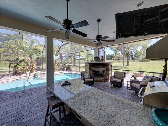 Fireplace, Glass Ceilings, Interior, Pool, Sun Room