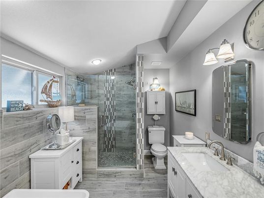 Bathroom, Dual Sink Vanities, Glass Shower, Interior, Wood Texture Flooring