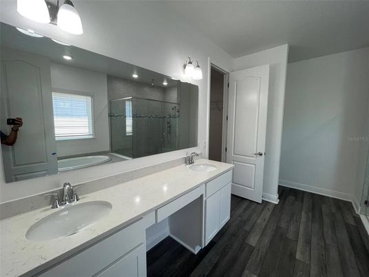 Bathroom, Dual Sink Vanities, Glass Shower, Interior, Wood Texture Flooring