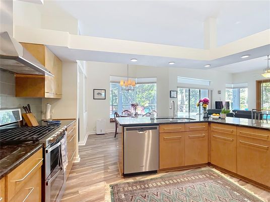 Chandelier, Dining room, Interior, Kitchen, Pendant Lights, Recessed Lighting, Stainless Steel Appliances, Wood Texture Flooring