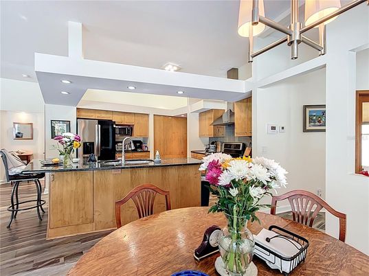 Dining room, Interior, Kitchen, Recessed Lighting, Stainless Steel Appliances, Wood Texture Flooring