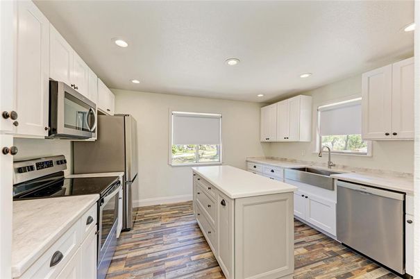 Interior, Kitchen, Recessed Lighting, Stainless Steel Appliances, Wood Texture Flooring