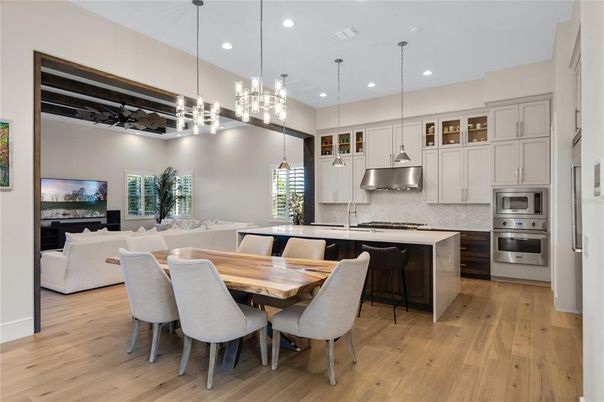 Dining room, Interior, Kitchen, Living room, Pendant Lights, Recessed Lighting, Stainless Steel Appliances, Wood Texture Flooring