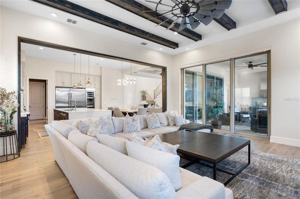 Dining room, Interior, Kitchen, Living room, Pendant Lights, Recessed Lighting, Stainless Steel Appliances, Wooden Beams, Wood Texture Flooring