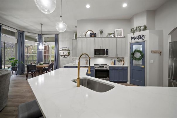 Dining room, Interior, Kitchen, Pendant Lights, Recessed Lighting, Stainless Steel Appliances, Wood Texture Flooring