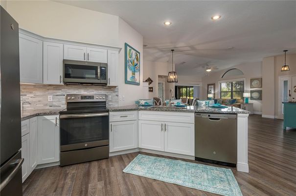 Interior, Kitchen, Pendant Lights, Recessed Lighting, Stainless Steel Appliances, Wood Texture Flooring