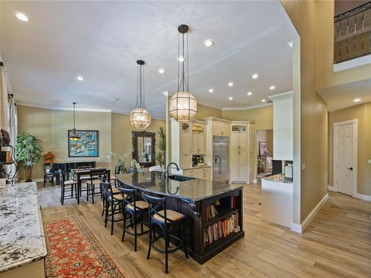 Dining room, Interior, Kitchen, Pendant Lights, Recessed Lighting, Stainless Steel Appliances, Wood Texture Flooring