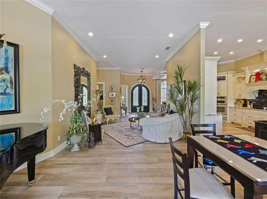 Chandelier, Dining room, Interior, Living room, Pendant Lights, Piano, Recessed Lighting, Wood Texture Flooring
