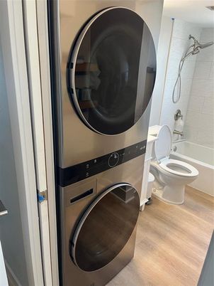 Bathroom, Interior, Utility Closets, Washer, Wood Texture Flooring