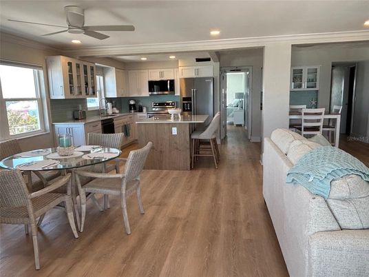 Dining room, Interior, Kitchen, Recessed Lighting, Stainless Steel Appliances, Wood Texture Flooring