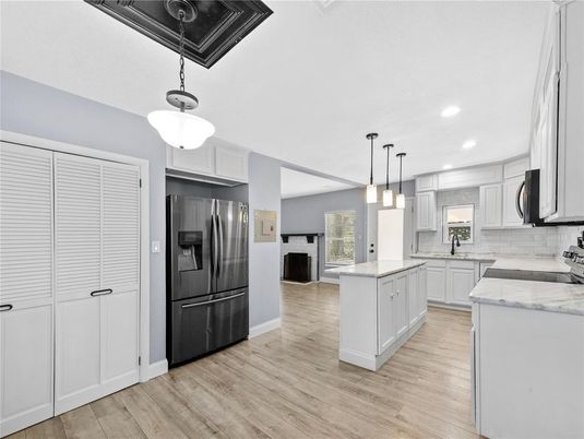 Interior, Kitchen, Pendant Lights, Recessed Lighting, Stainless Steel Appliances, Wood Texture Flooring