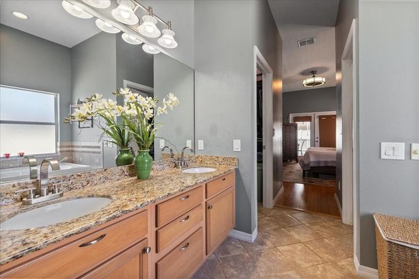 Bathroom, Dual Sink Vanities, Interior, Recessed Lighting, Wood Texture Flooring