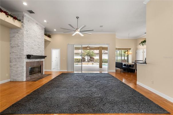 Dining room, Fireplace, Interior, Pendant Lights, Recessed Lighting, Stone Walls, Wood Texture Flooring