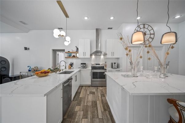 Interior, Kitchen, Pendant Lights, Recessed Lighting, Stainless Steel Appliances, Wood Texture Flooring