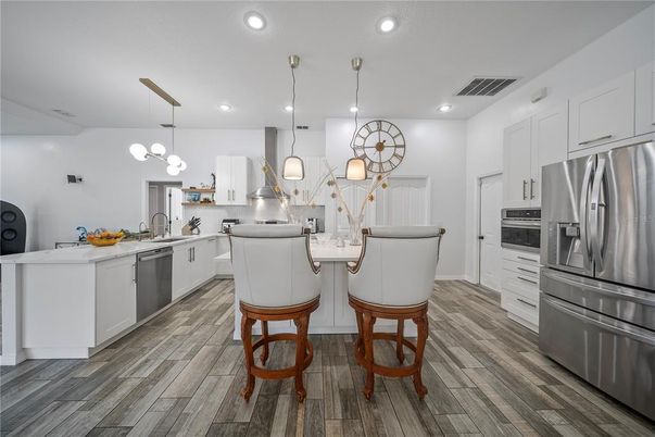 Interior, Kitchen, Pendant Lights, Recessed Lighting, Stainless Steel Appliances, Wood Texture Flooring