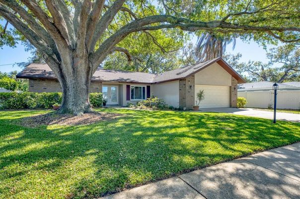 Attached, Backyard, Exterior, Facade, Brick Facade, Ranch