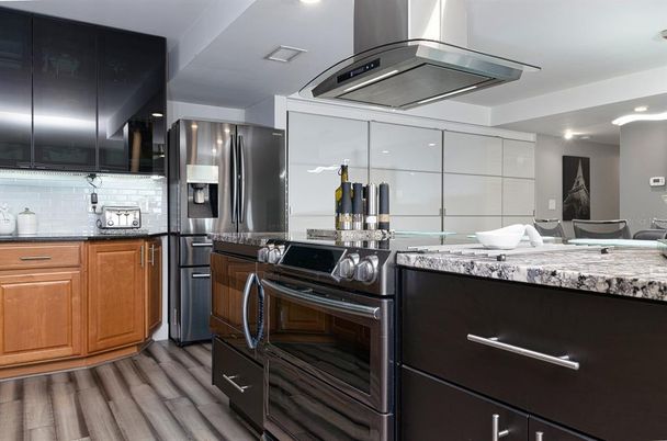 Interior, Kitchen, Recessed Lighting, Stainless Steel Appliances, Wood Texture Flooring