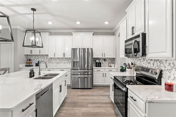Interior, Kitchen, Pendant Lights, Recessed Lighting, Stainless Steel Appliances, Wood Texture Flooring