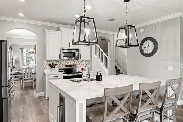 Interior, Kitchen, Pendant Lights, Recessed Lighting, Stainless Steel Appliances, Wood Texture Flooring