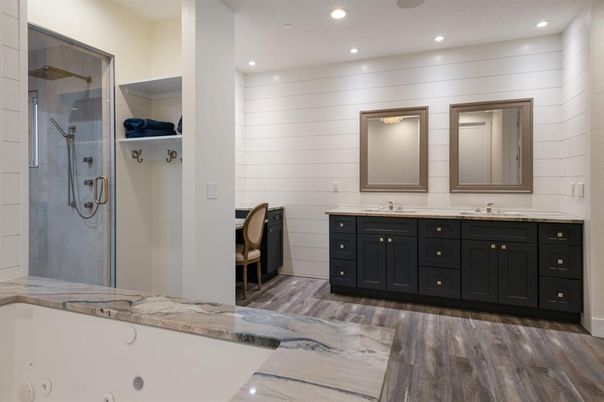 Bathroom, Dual Sink Vanities, Glass Shower, Interior, Recessed Lighting, Wood Texture Flooring