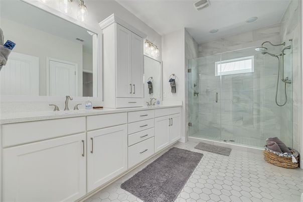 Bathroom, Dual Sink Vanities, Glass Shower, Interior, Marble Walls, Recessed Lighting