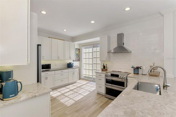 Interior, Kitchen, Recessed Lighting, Stainless Steel Appliances, Wood Texture Flooring