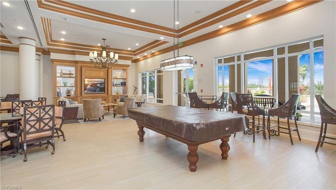 Billiard Table, Chandelier, Dining room, Game Room, Interior, Living room, Pendant Lights, Recessed Lighting, Wood Texture Flooring