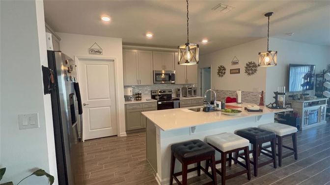 Interior, Kitchen, Pendant Lights, Recessed Lighting, Stainless Steel Appliances, Wood Texture Flooring