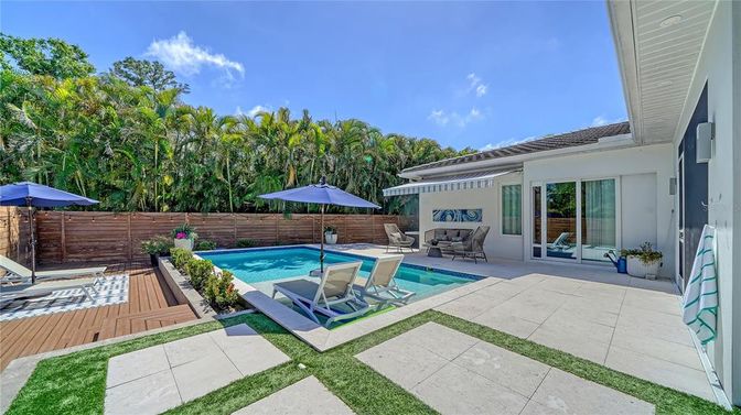 Exterior, Pool, Solar Panels