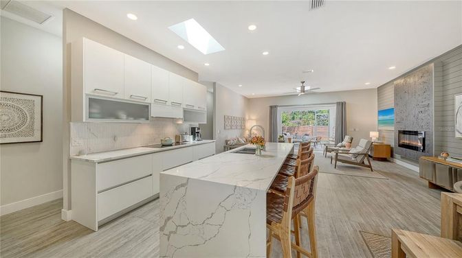 Dining room, Fireplace, Interior, Kitchen, Living room, Recessed Lighting, Wood Texture Flooring