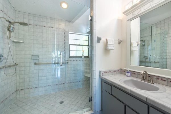 Bathroom, Glass Shower, Interior, Recessed Lighting, Tile Countertops