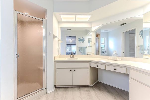 Bathroom, Dual Sink Vanities, Glass Shower, Interior, Wood Texture Flooring