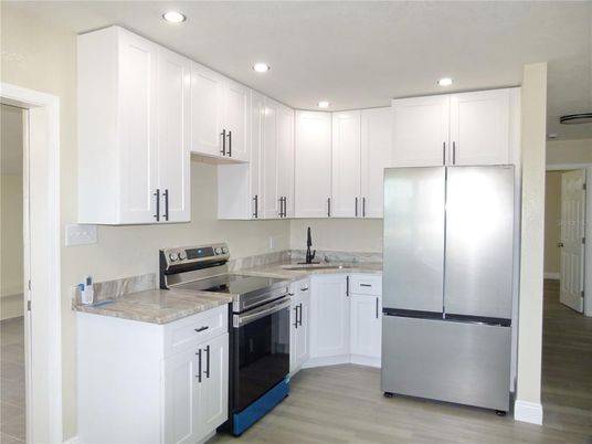 Interior, Kitchen, Recessed Lighting, Stainless Steel Appliances, Wood Texture Flooring