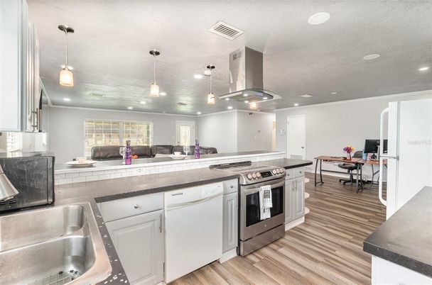 Interior, Kitchen, Pendant Lights, Recessed Lighting, Stainless Steel Appliances, Wood Texture Flooring