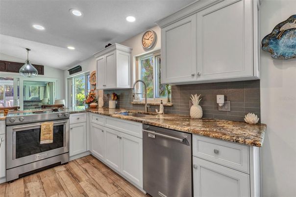 Interior, Kitchen, Pendant Lights, Recessed Lighting, Stainless Steel Appliances, Wood Texture Flooring