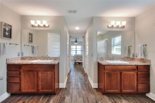 Bathroom, Dual Sink Vanities, Interior, Recessed Lighting, Wood Texture Flooring