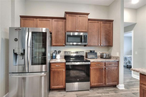 Interior, Kitchen, Recessed Lighting, Stainless Steel Appliances, Wood Texture Flooring