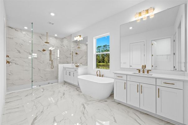 Bathroom, Dual Sink Vanities, Free Standing Baths, Glass Shower, Interior, Marble, Marble Walls, Recessed Lighting
