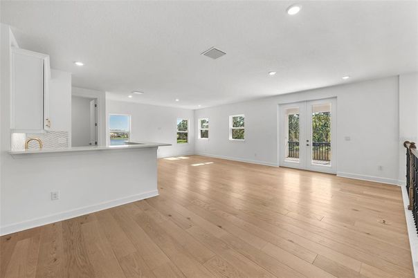 Empty room, Fireplace, Interior, Kitchen, Recessed Lighting, Wood Texture Flooring