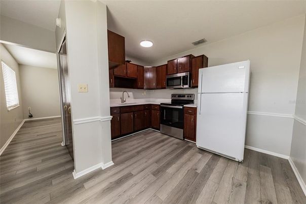 Interior, Kitchen, Stainless Steel Appliances, Wood Texture Flooring