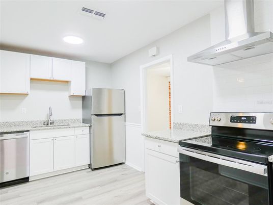 Interior, Kitchen, Recessed Lighting, Stainless Steel Appliances, Wood Texture Flooring