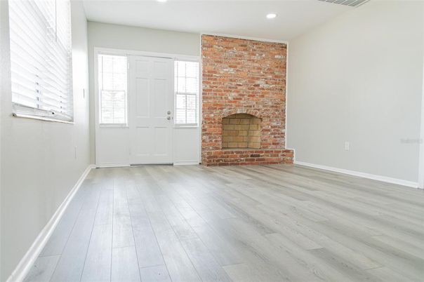 Fireplace, Interior, Recessed Lighting, Stone Walls, Wood Texture Flooring